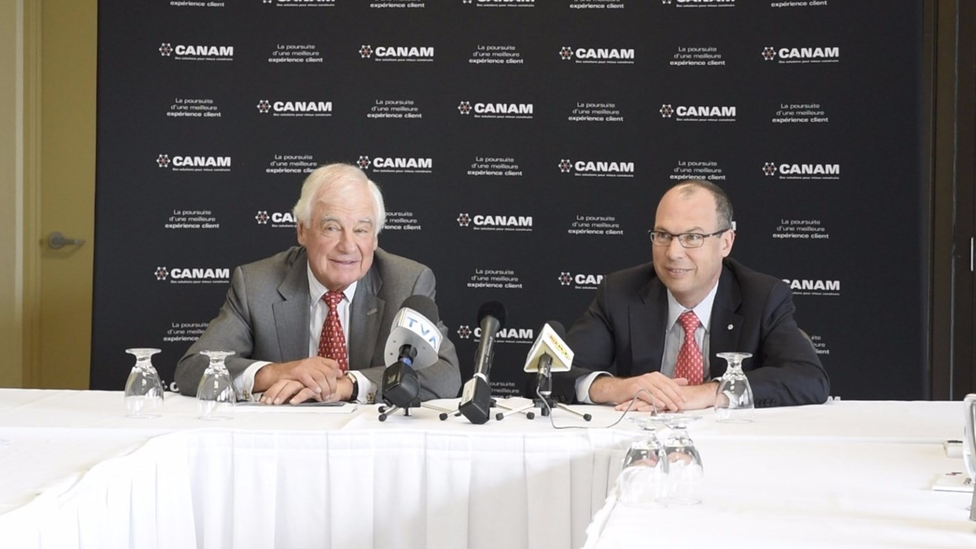 De gauche à droite Marcel Dutil, président du conseil d'administration du Groupe Canam et Marc Dutil, chef de la direction, au cours de la conférence de presse qui a suivi l'assemblée générale de ce matin.