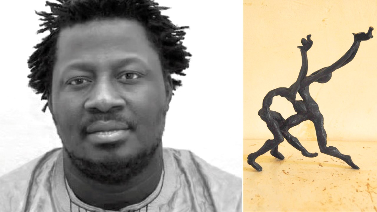 Le sculpteur burkinabé Yacouba Toure et l'oeuvre qu'il réalisera pour Beauce Art « Dansons dans un monde de paix ». 