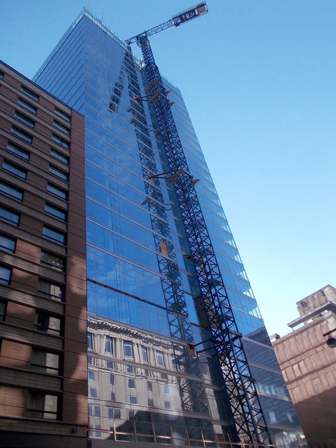 Construction de la Maison Manuvie, un nouveau gratte-ciel de 28 étages à Montréal.
