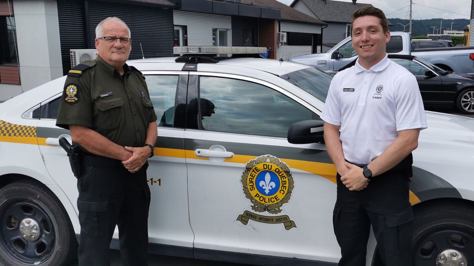 L'agent de la Sûreté du Québec, Mario Thiboutot, en compagne du cadet William Allard-Laliberté.