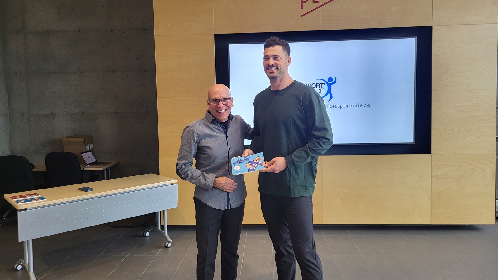 Sylvain Croteau, directeur général de Sport'Aide et Antony Auclair