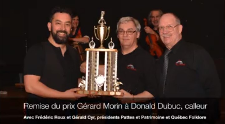 Lors de son passage au call à la veillée des Pattes et Patrimoine à Longueuil avec Carmen Guérard à l’accordéon, Richard Forest au violon et Benoit Legault au piano, Donald Dubuc eu la grande surprise de recevoir le prix Gérard Morin, qui est remis à chaque année à un calleur s’étant démarqué par son engagement dans la pratique du call. C’est avec plaisir qu’il a reçu le prix des mains de Frédéric Roux et Gérard Cyr, présidents de Pattes et Patrimoine et de Québec Folklore.