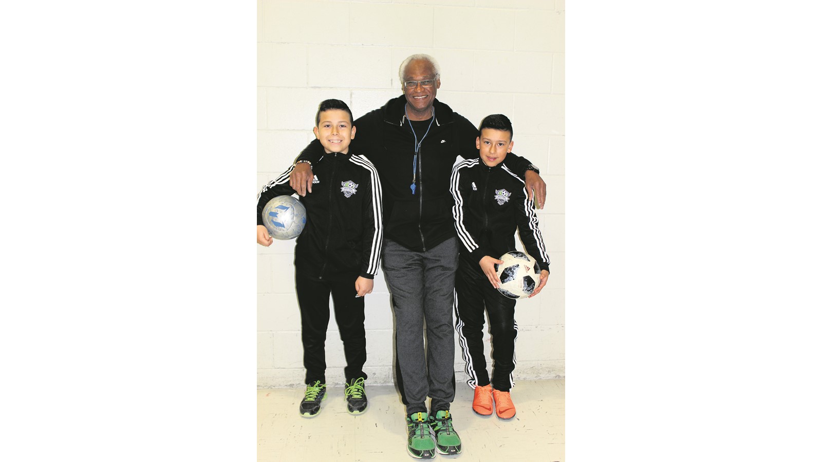 Yohan et Alexy accompagné de Gérard Robinson.