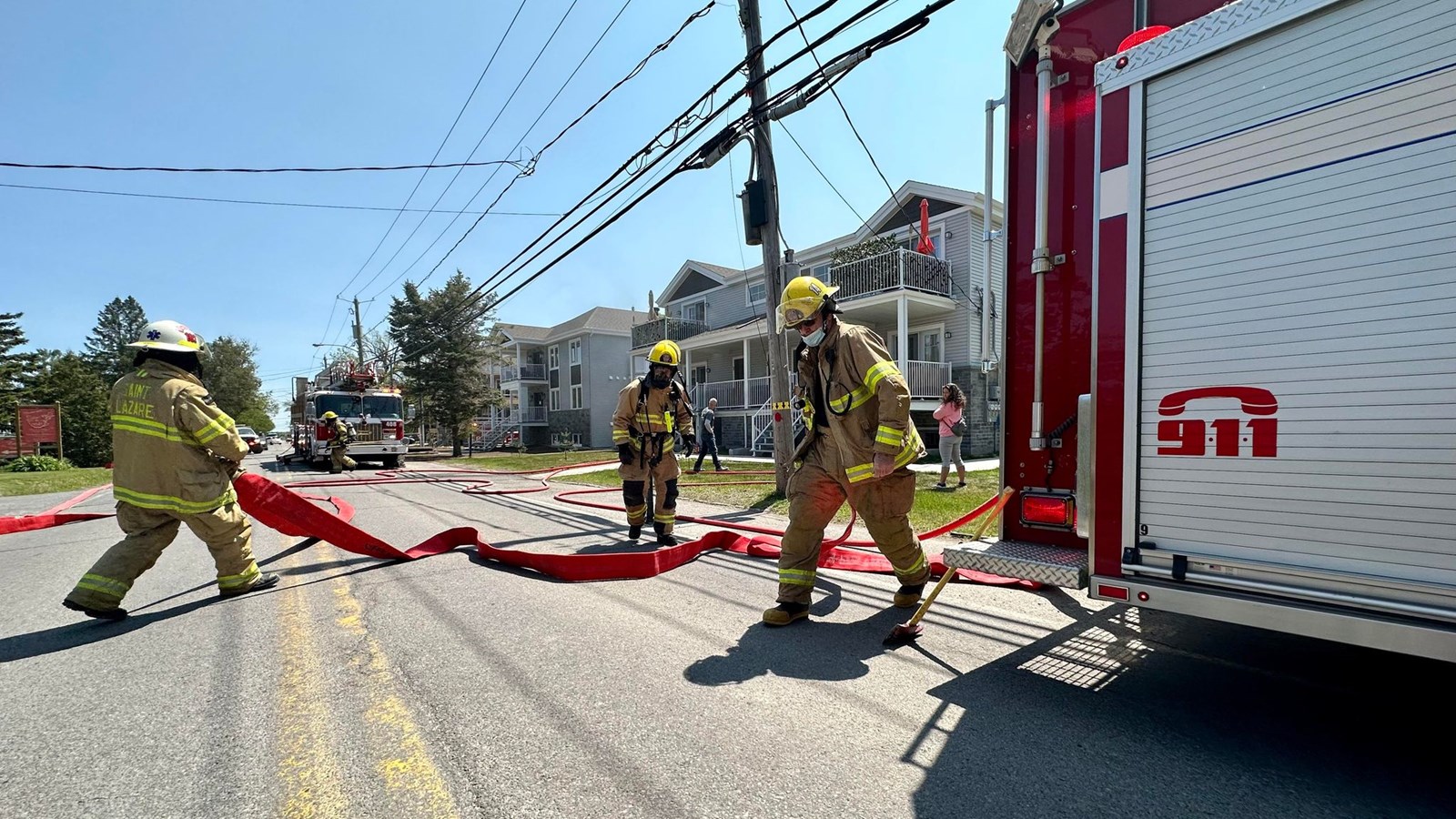 Firefighters on the scene of a basement dwelling fire in St. Lazare this afternoon.
