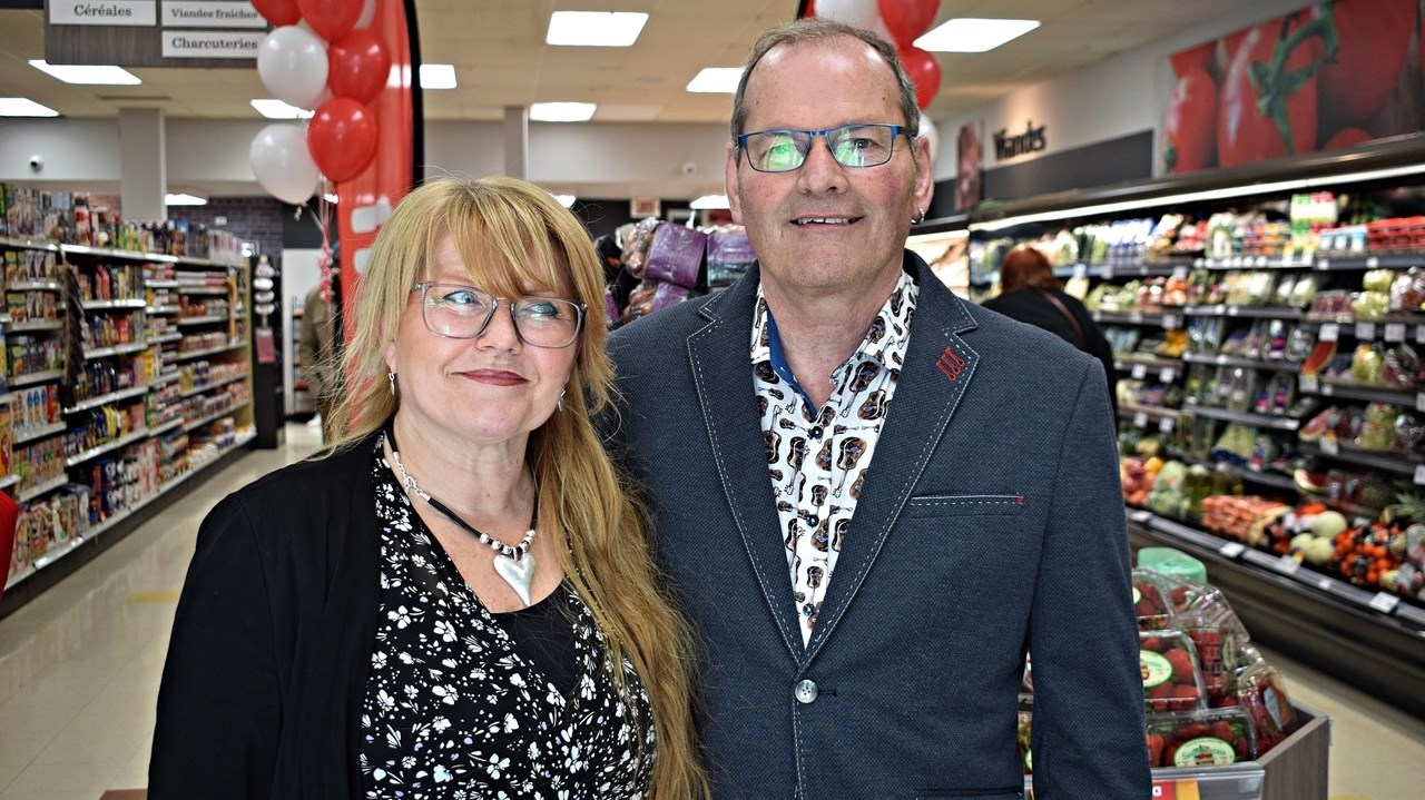 Lori Vansteene and Claude McSween, owner of the new Marché Ami grocery store in Ste. Anne de Bellevue. The store officially opened this morning.