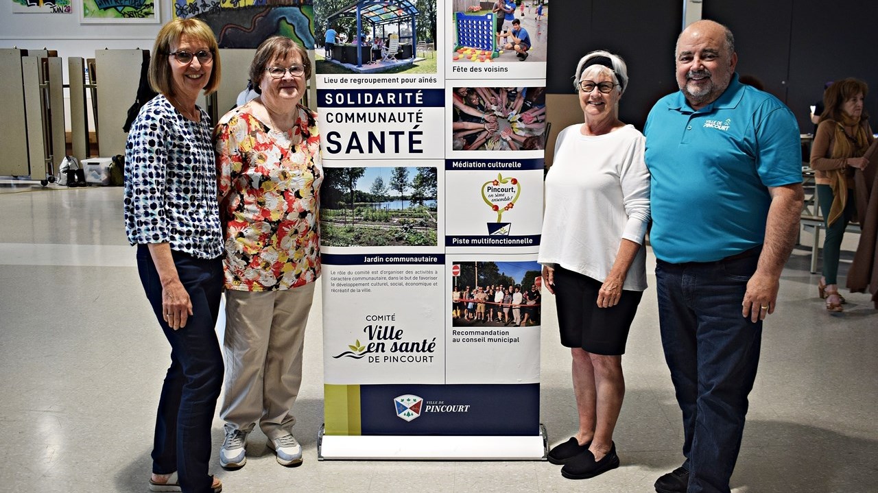 Josée Maltais (left), Chantal McCloud, city Councillor Denise Bergeron and Mayor Claude Comeau at the free dental cleaning clinic organized by the Pincourt Ville en Santé health committee on Saturday, May 27.