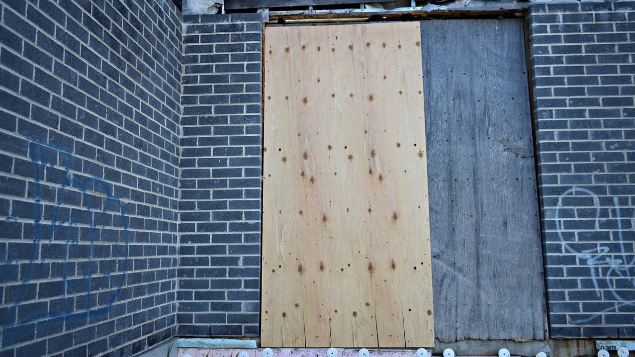 A new plywood panel completely covers the north side entrance of the Pincourt arena as of May 28.
