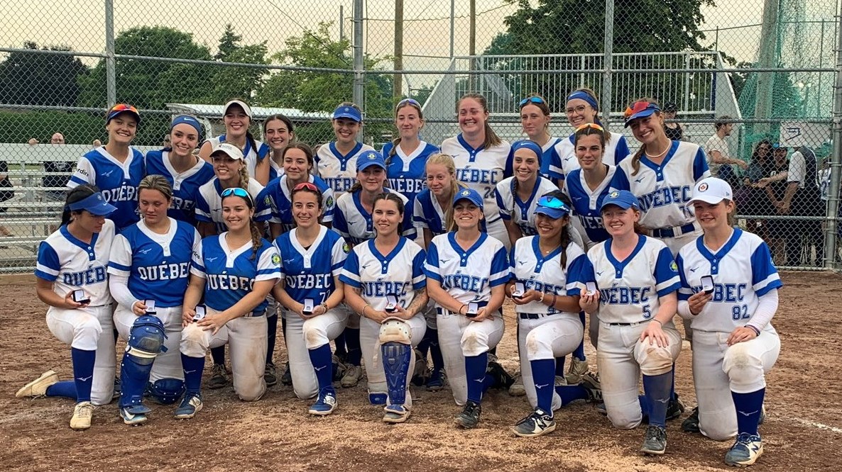 The U23 team in white and the U17 team in blue pose with the rings awarded at the end of the tournament.   