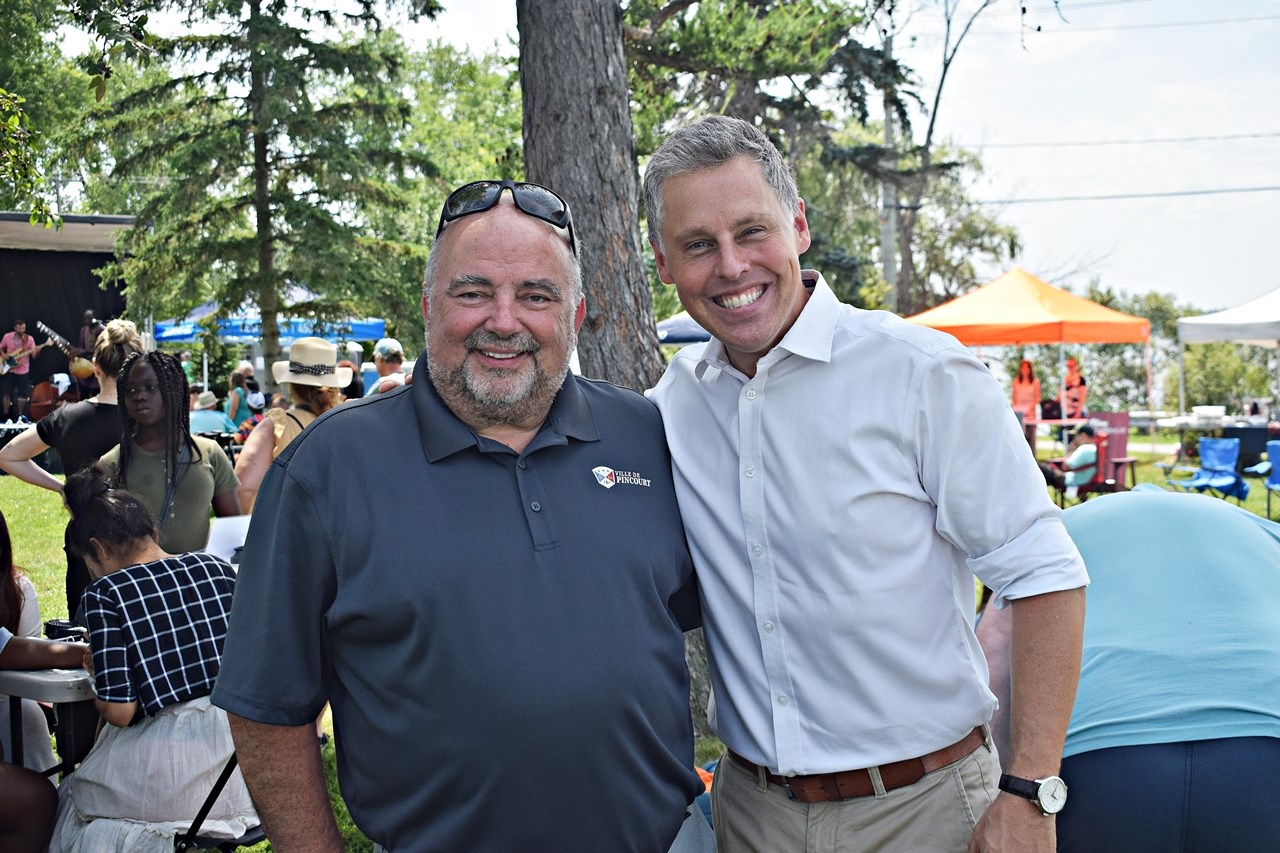 Pincourt Mayor Claude Comeau (right) and federal Liberal Vaudreuil-Soulanges MP Peter Schiefke at the Intercultural Festival in Bellevue Park on Saturday, July 8.