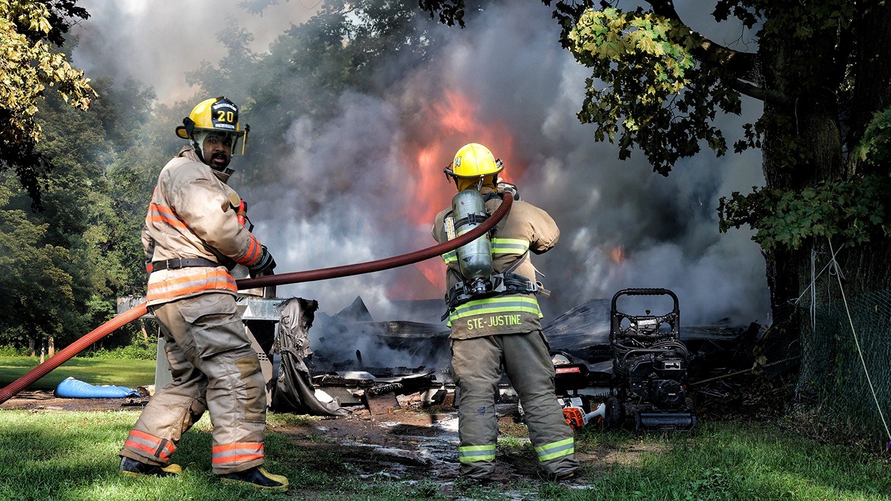 A garage is destroyed by flames