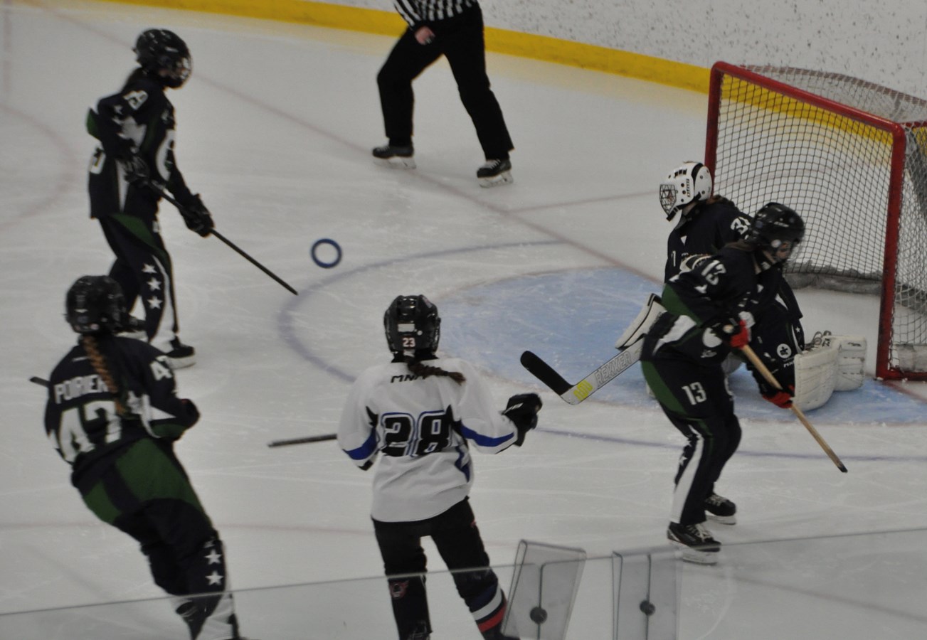 Despite Montreal's repeated onslaughts, the ringette team held out for an easy win in their Sunday matinee game at Bishop's Arena 