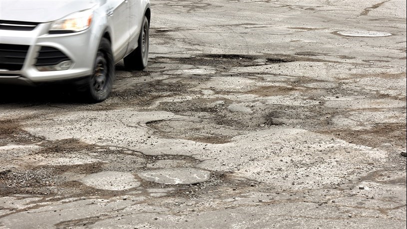 The "worst roads" effect: repaving Quebec one vote at a time over the past 9 years