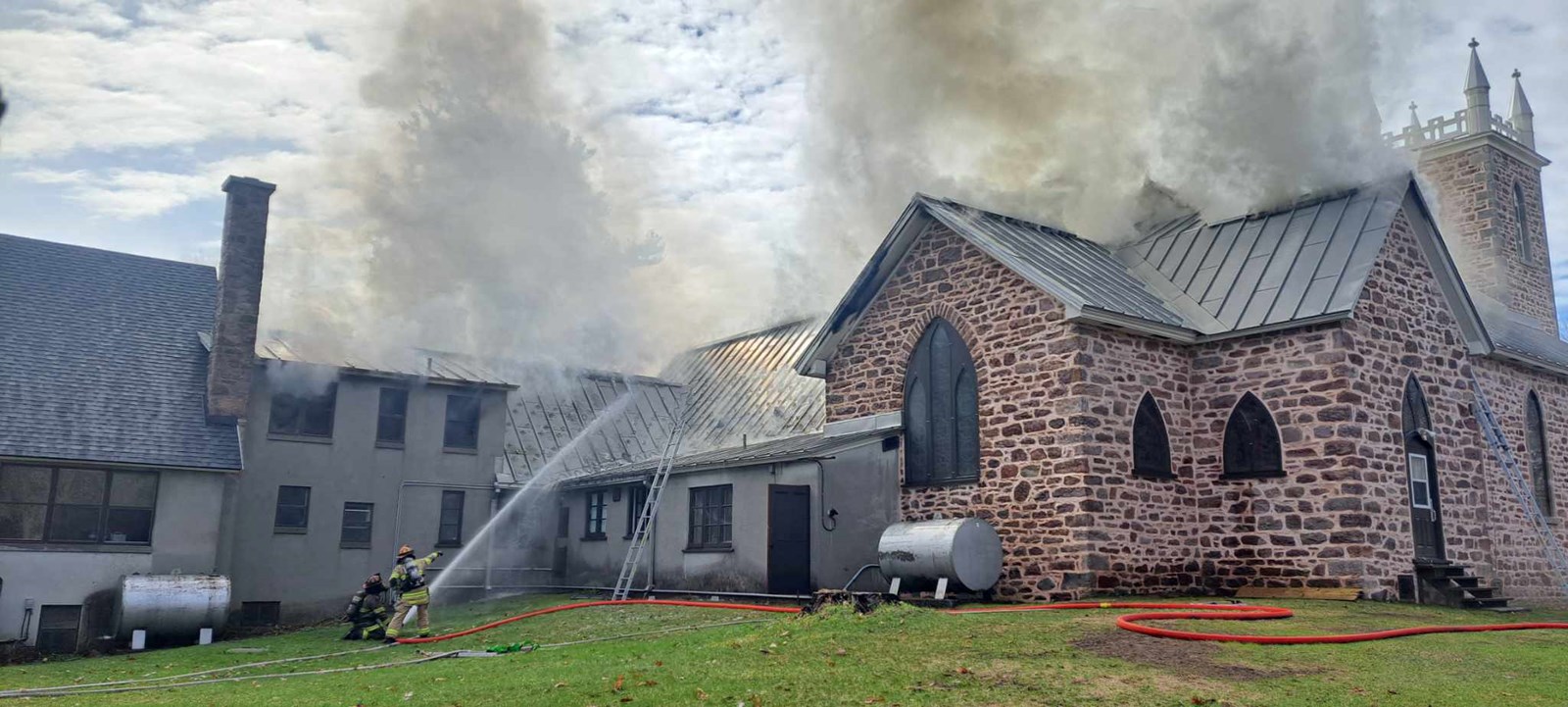 Fire in progress at St. James Anglican Church in Hudson