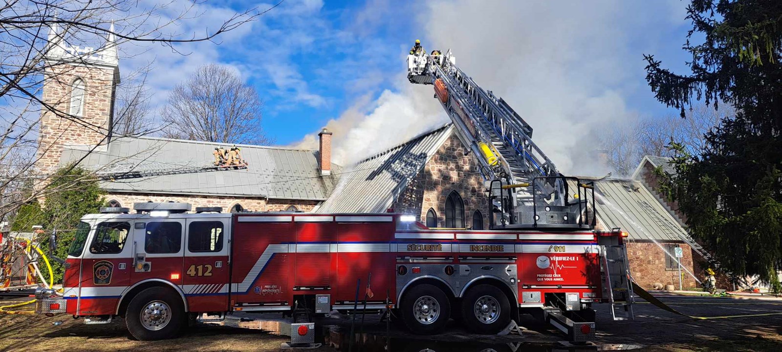 Fire in progress at St. James Anglican Church in Hudson