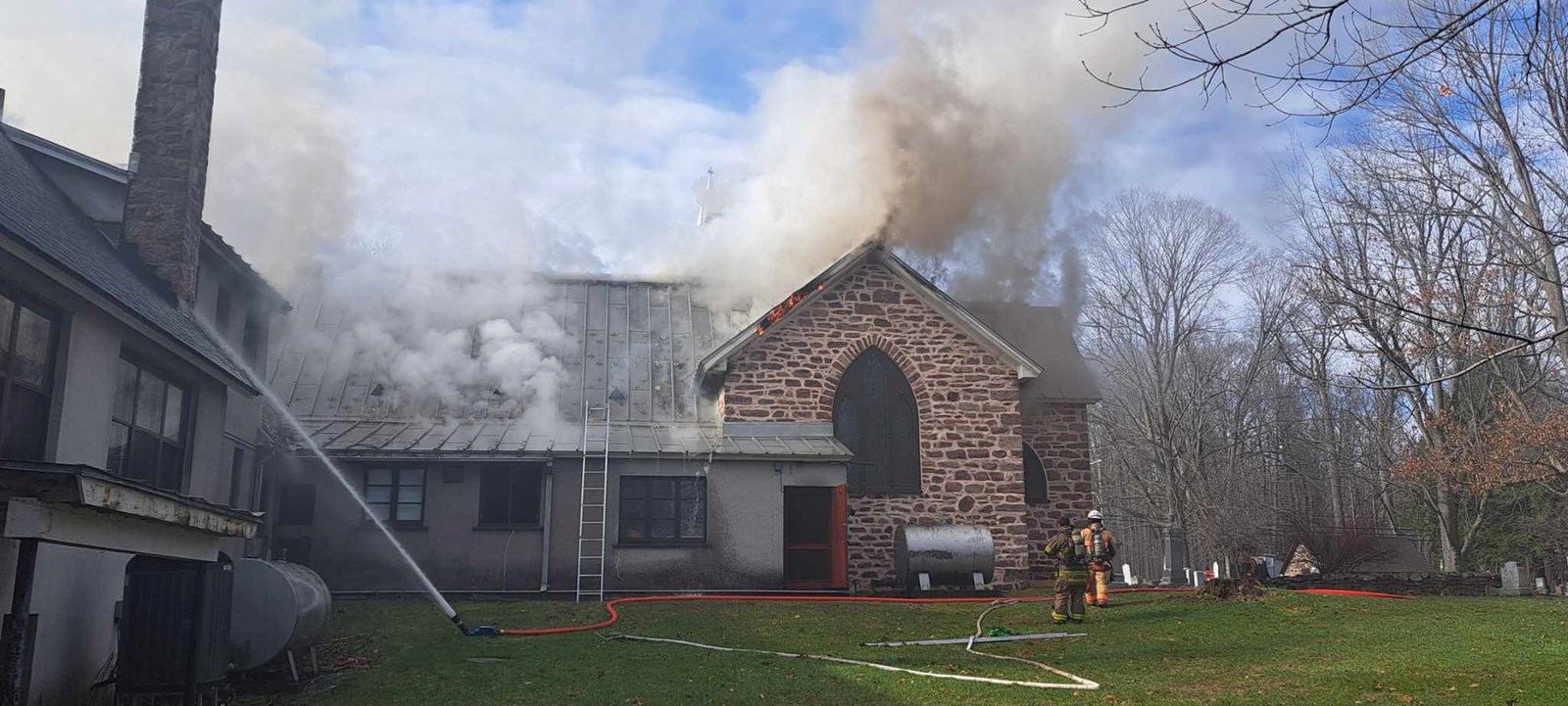Fire in progress at St. James Anglican Church in Hudson
