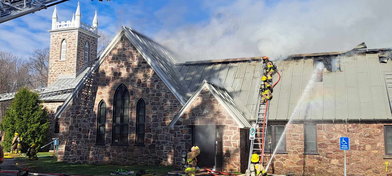 Fire in progress at St. James Anglican Church in Hudson