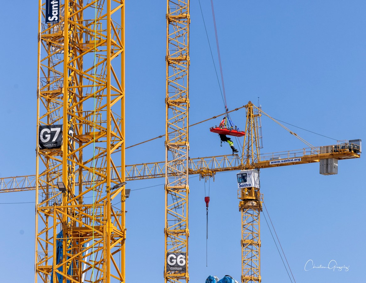 The region's firefighters practice their high-altitude rescue skills on the site of the future hospital 