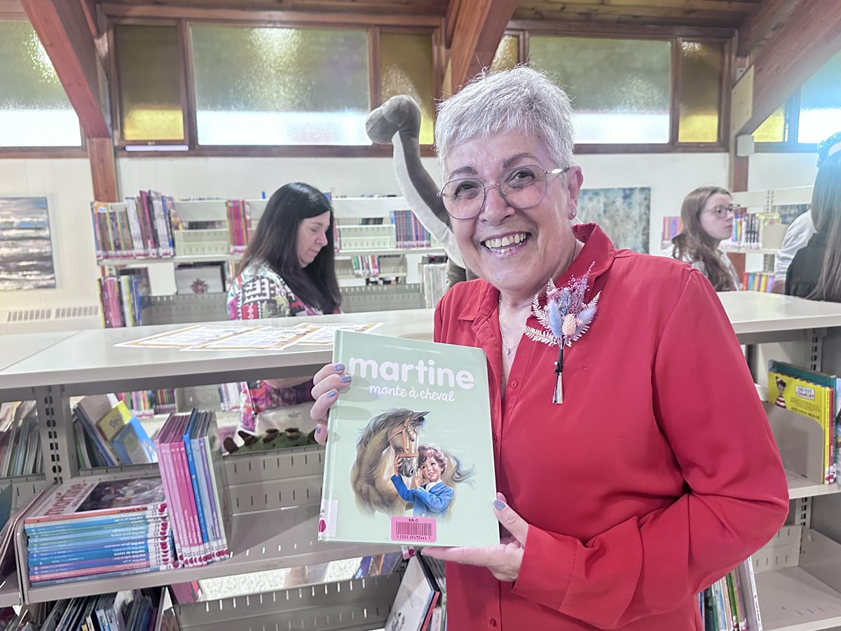 Johanne Séguin Poirier worked at the old library for 31 years, and she is the one who has been affixing barcodes to all books