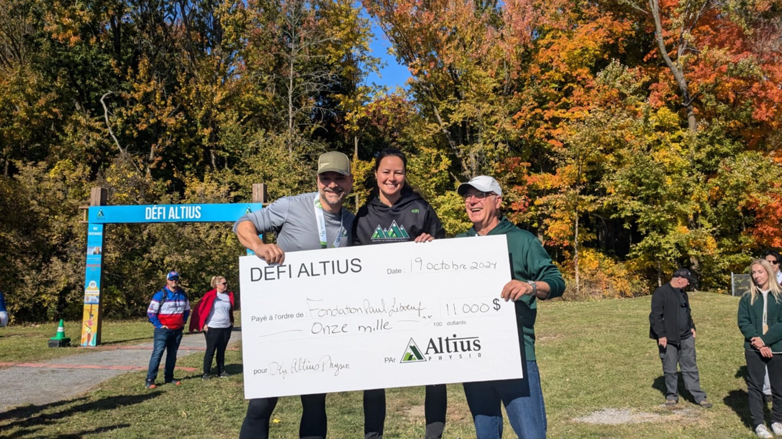 Center Notre-Dame-de-Fatima General Manager Steven Grenier poses with Altius Physio's Charlène de GrosBois and Paul-Leboeuf Foundation President Dominique Janelle