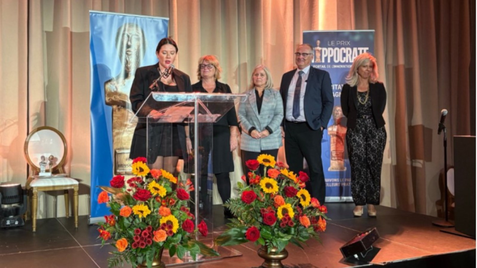 From left to right: Victoria Martineau, Vigilance family outreach worker, Caroline Baulne, Executive Director, ABC de la Famille, Isabelle Papineau, Director, Youth Programs and Public Health Activities, and Bernard Cyr, Assistant Executive Director, General and Specialized Physical Health Programs 