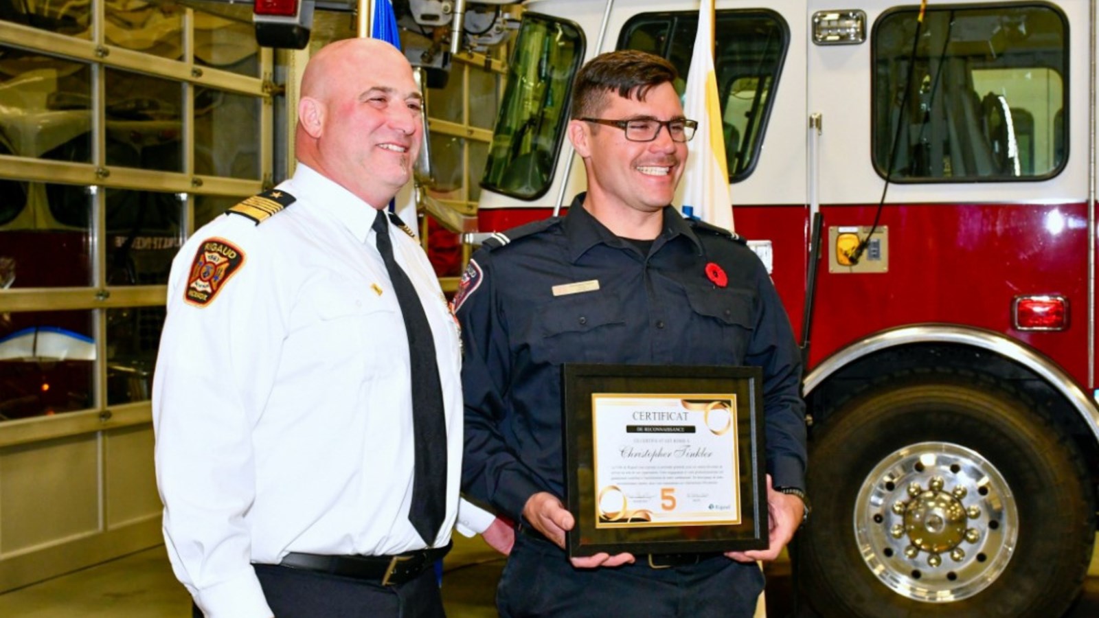Christopher Tinkler honored for 5 years of service  