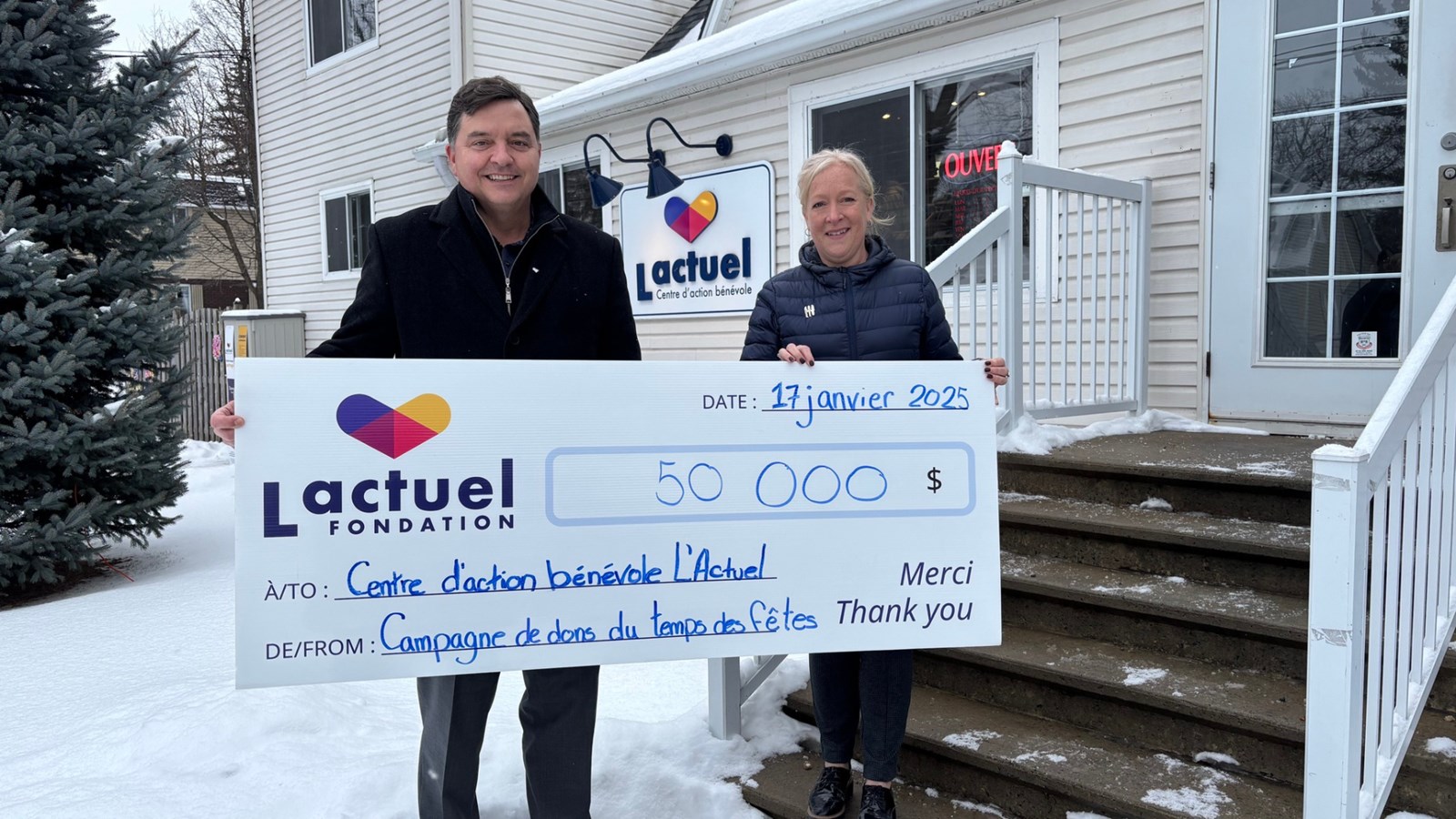 André Gingras of Groupe AutoForce poses with CAB L'Actuel General Manager Marie Legrand   