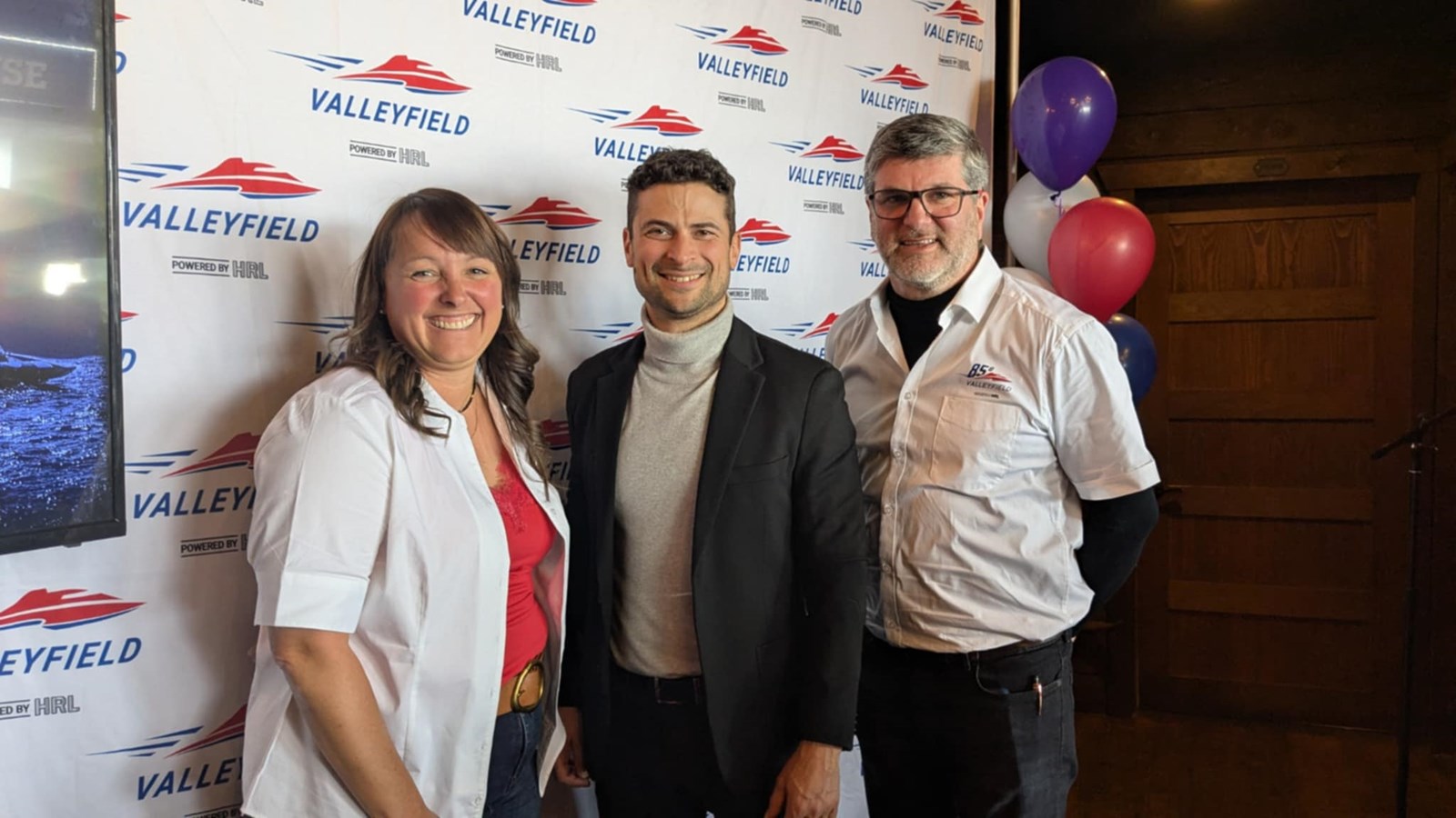 Régates de Valleyfield general manager Émilie Daoust poses with Salaberry-de-Valleyfield mayor Miguel Lemieux and Régates board chairman Didier-Bernard Séguin