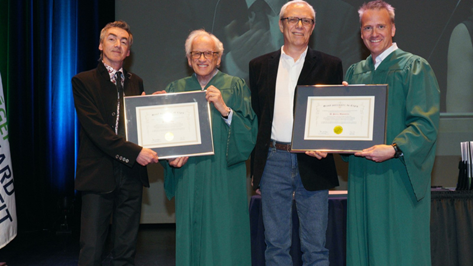 Mario Roy, professeur de batterie et de percussions à Édouard-Montpetit de 1984 à 2019, Jean-Paul Gagné, président du conseil d’administration du cégep Édouard-Monpetit, Pierre Moussette, professeur de guitare et de basse au Cégep de 1978 à 2018, et Sylvain Lambert, directeur général du Cégep, lors de la remise du diplôme honorifique, le mercredi 22 mai 2019. Absente de la photo : Édith Myers, professeure de chant et de comédie musicale au Cégep de 1982 à 2007.