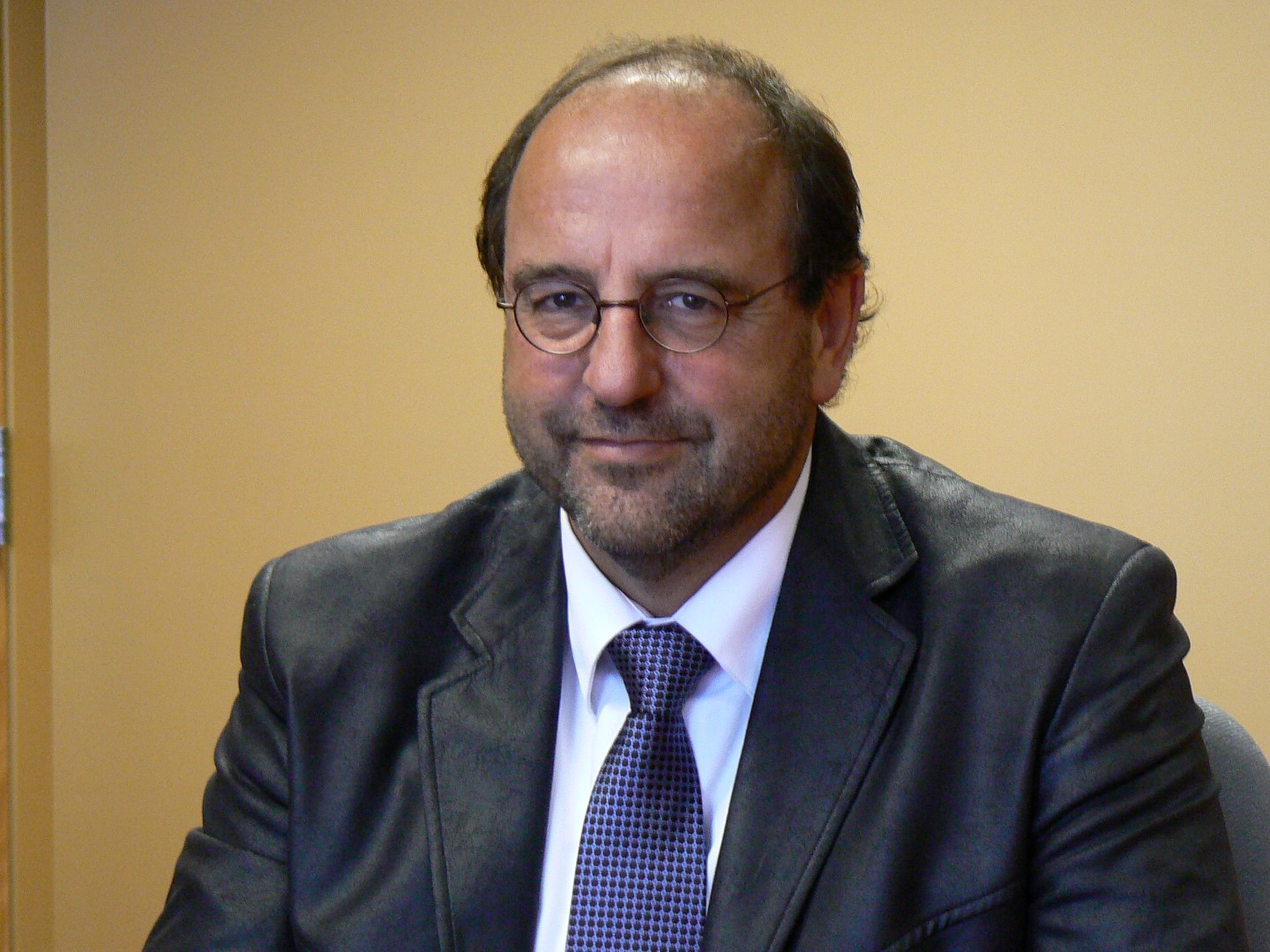 Dr Alain Poirier.