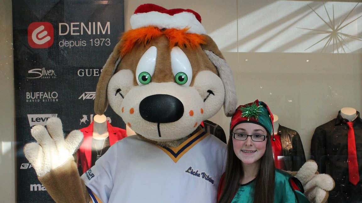 La mascotte "Lèche-Vitrine" et un lutin du Père Noël