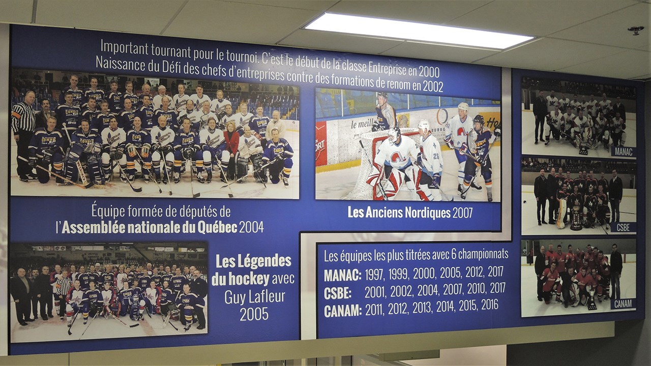 La murale, installée au 2e et 3e étages du salon Comrie du Centre sportif Lacroix-Dutil de Saint-Georges et commémorant les 68 ans d'histoire du tournoi de hockey Comrie Desjardins, a été inaugurée lors du vendredi 9 février 2018.