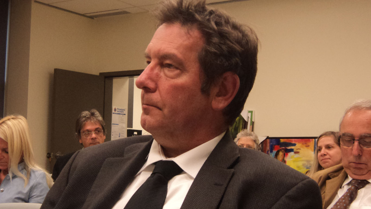 Représentant le secteur médias, Michel Harnois