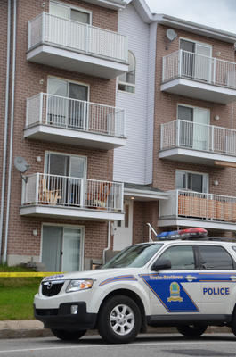 C'est dans l'appartement au rez-de-chaussée qu'a eu lieu le meurtre d'une dame de 26 ans. Trois-Rivières le 1er octobre 2011. NICOLAS DUCHARME/L'ÉCHO DE TROIS-RIVIÈRES/AGENCE QMI