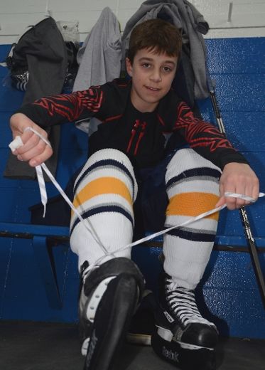 Xavier Bouchard avec la crème des hockeyeurs pee-wee