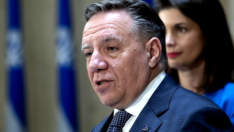 Sondage: les Québécois sont d'accord avec les chèques, selon Legault