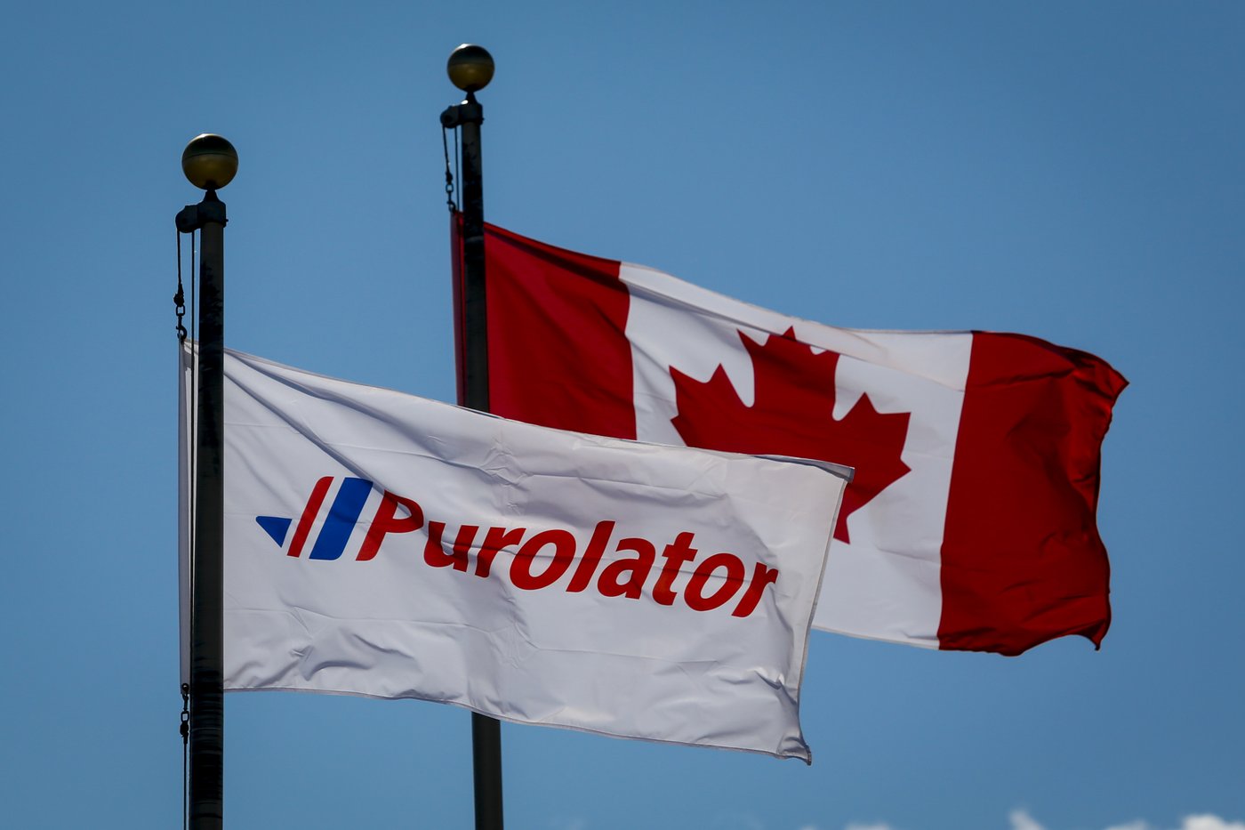 Grève chez Postes Canada: Surmenés, Purolator et UPS suspendent des envois