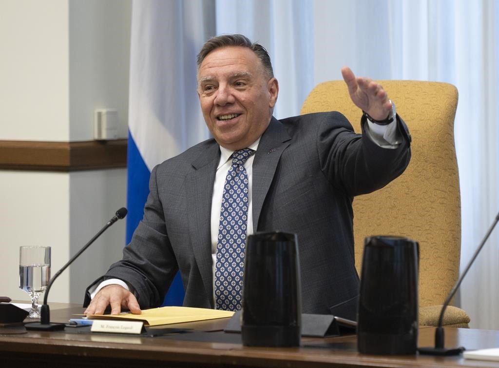 Pas de retour du masque obligatoire à court terme, dit Legault